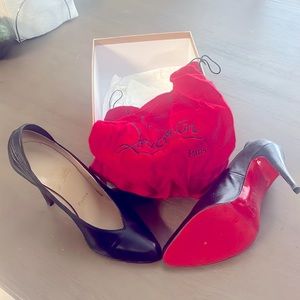 Christian Louboutin Booties.Sexy high arch with Protected Sole. Lightly used.